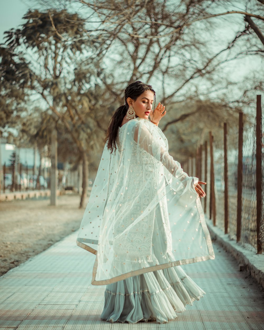 Model in an ivory handloom outfit